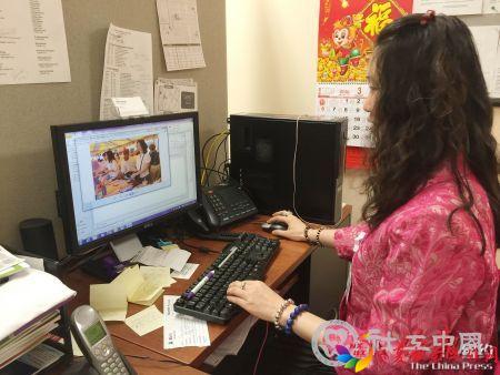 罗洁在工作中。（侨报记者崔国萁摄）